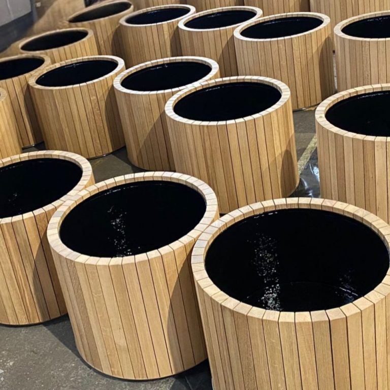 Circular wooden planter protectors